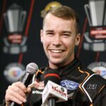 Ben Rhodes, driver of the #99 Kubota Ford, speaks to the media during the NASCAR Championship Media Day at Phoenix Raceway on November 02, 2023 in Avondale, Arizona. (Photo by Sean Gardner/Getty Images)