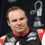 Cole Custer, driver of the #00 Haas Automation Ford, speaks to the media during the NASCAR Championship Media Day at Phoenix Raceway on November 02, 2023 in Avondale, Arizona. (Photo by Sean Gardner/Getty Images)